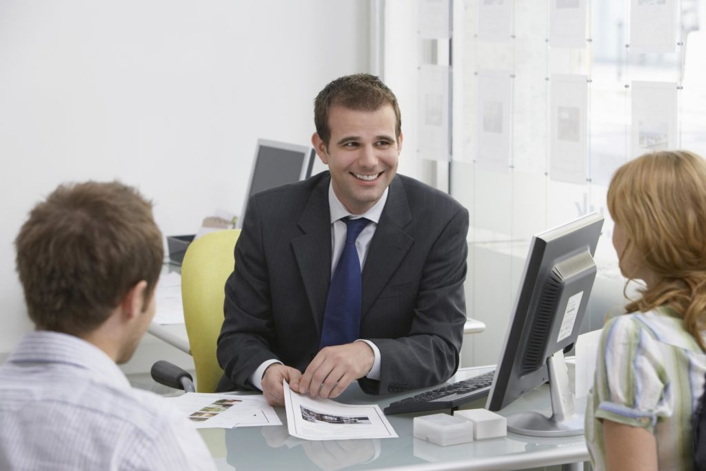 lawyer talking to his clients